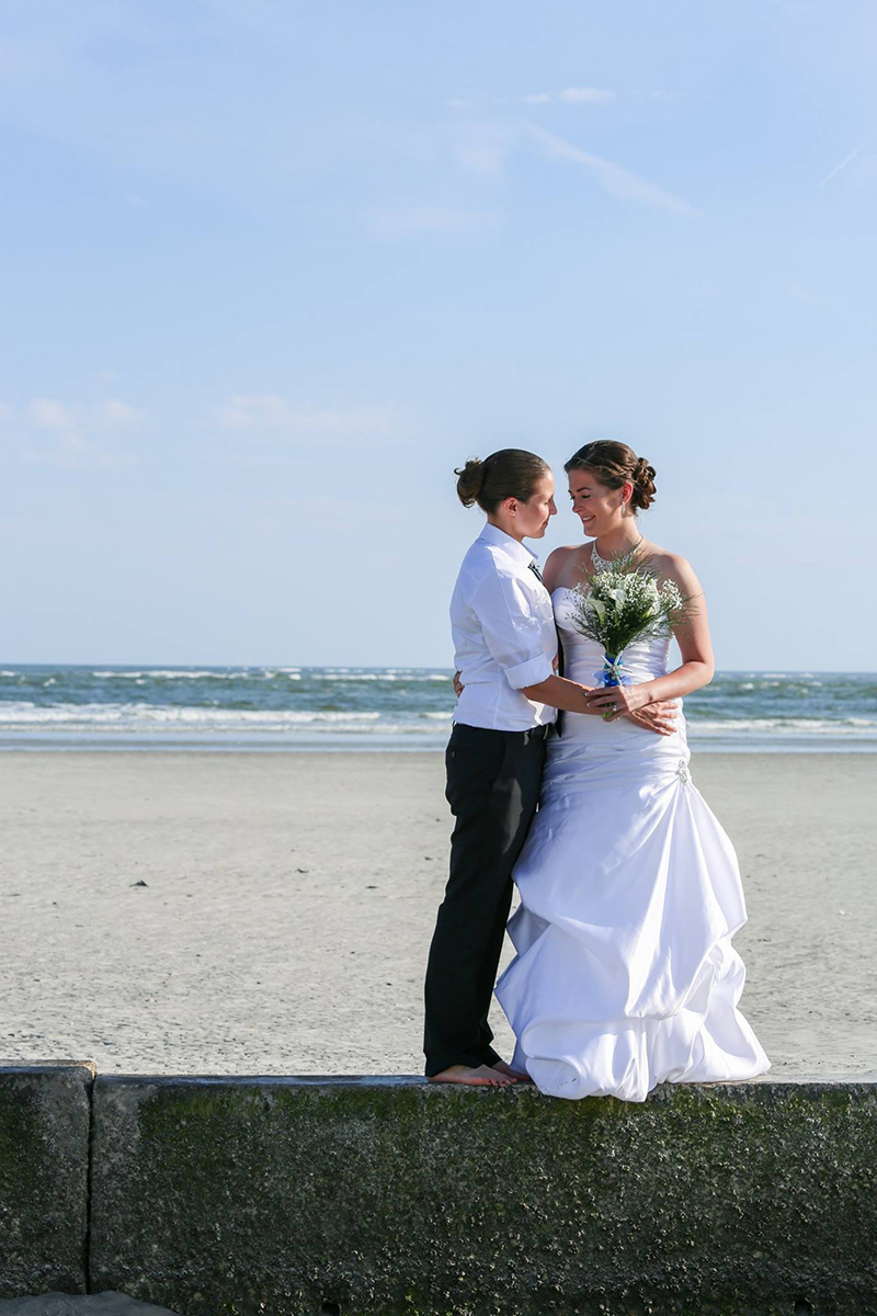Gorgeous LGBT couple wedding photo on Tybee Island Beach - Elope to Savannah