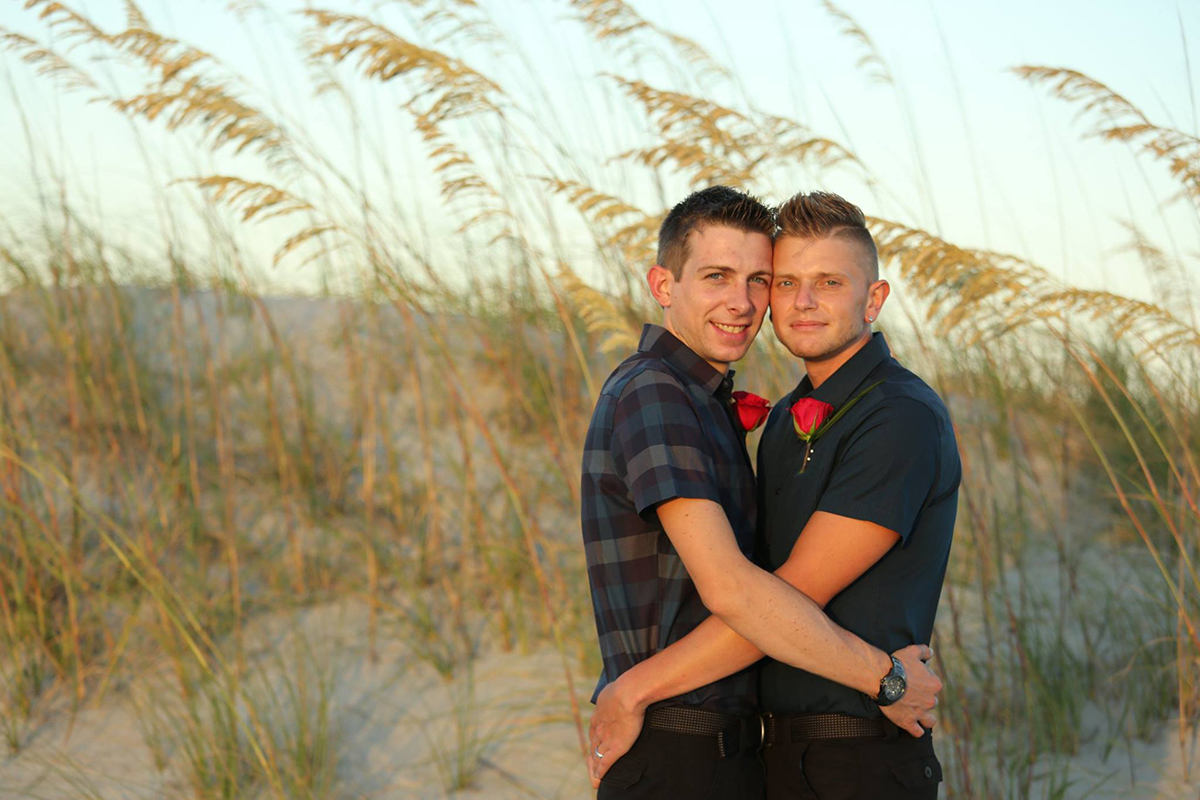 Handsome young gay couple on Tybee Island, Elopement